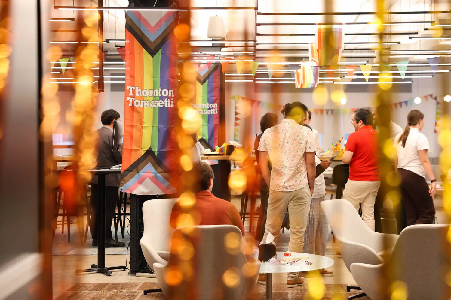Thornton Tomasetti employees gather at a Spectrum Pride event in the office.