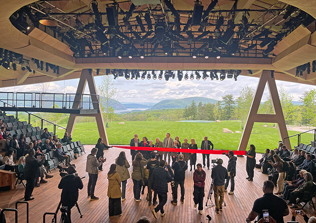 The 451-seat, open-air theater is the focal point of the company’s 98-acre arts complex and is defined by a dramatic mass-timber roof inspired by the shape of a bird’s wing. 