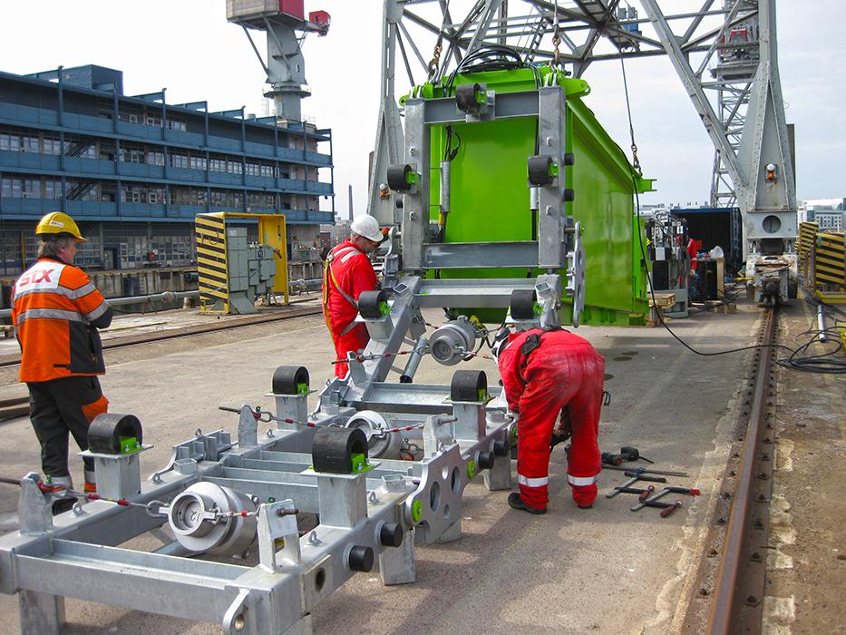 Airgun array being configured to match a ship’s hull profile using angled braces between each airgun support frame.