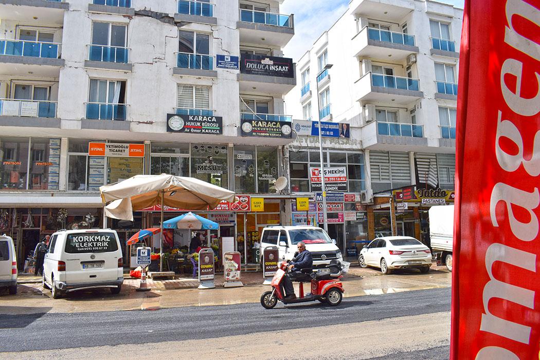 Commercial shops on the first two stories of mixed-used buildings in downtown Torkoglu have reopened. The residential units in the upper floors, however, remained unoccupied.