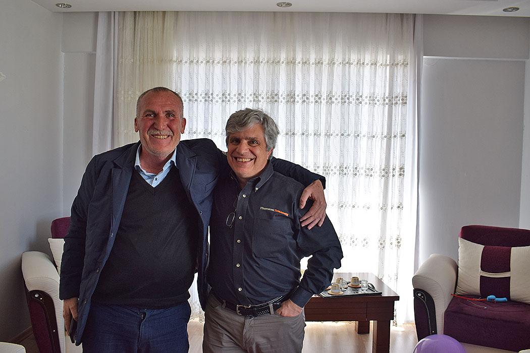 Managing Principal John Abruzzo (right) with a Malatya resident who invited our team into to his apartment to inspect non-structural damage. 