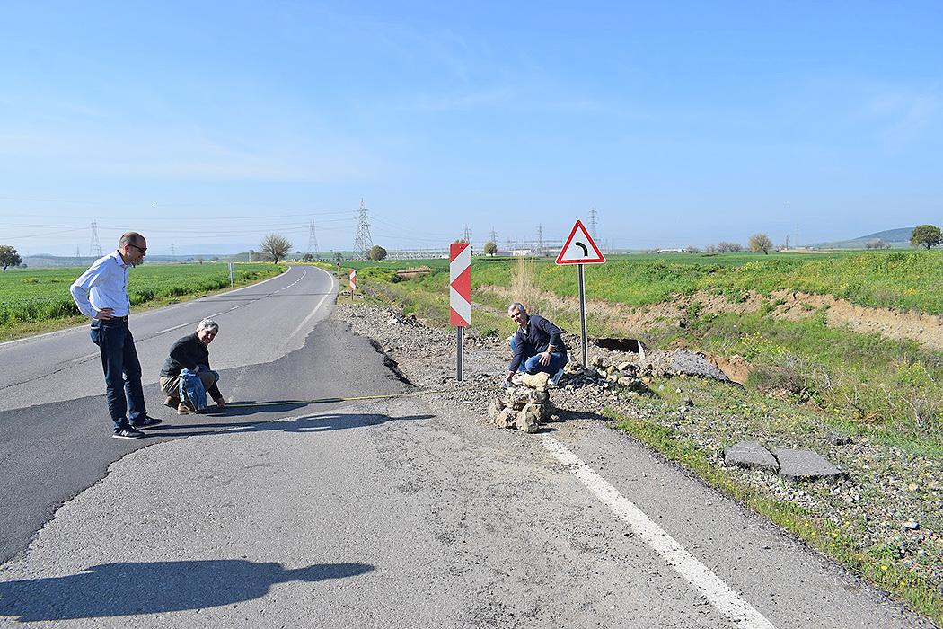 Vice President Onur Ihtiyar, Managing Principal John Abruzzo and Principal Kerem Gulec measuring the lateral shift of a road near Kahramanmaraş, Turkey. The lateral shift was 10 feet.