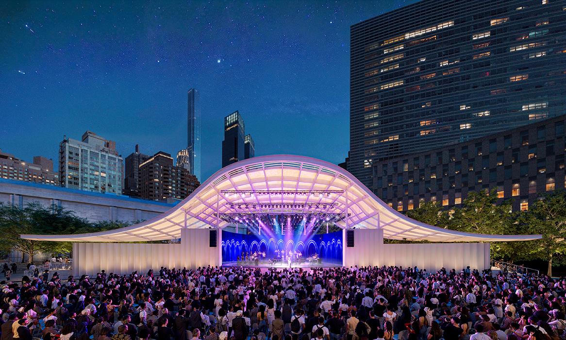 Lincoln Center Damrosch Park Revitalization in New York. View of amphitheater and audience area during performance looking southeast towards 62nd Street.
