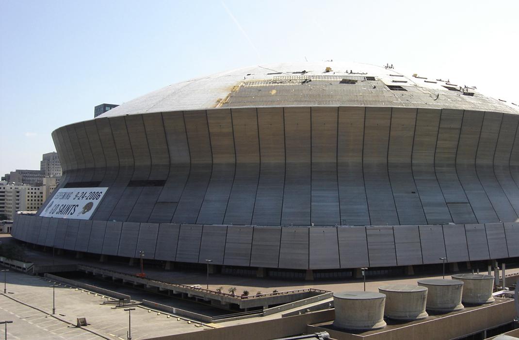 Assessing roof damage from Hurricane Katrina in New Orleans, Louisiana. 