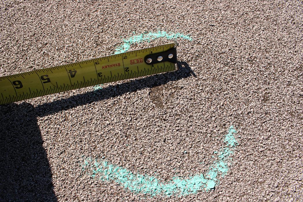 Hail impact on granule-surfaced modified bitumen roofing.
