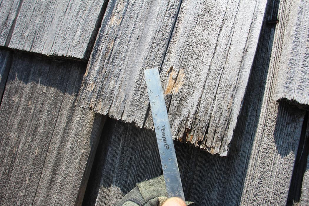 Hail impact on shake roofing.