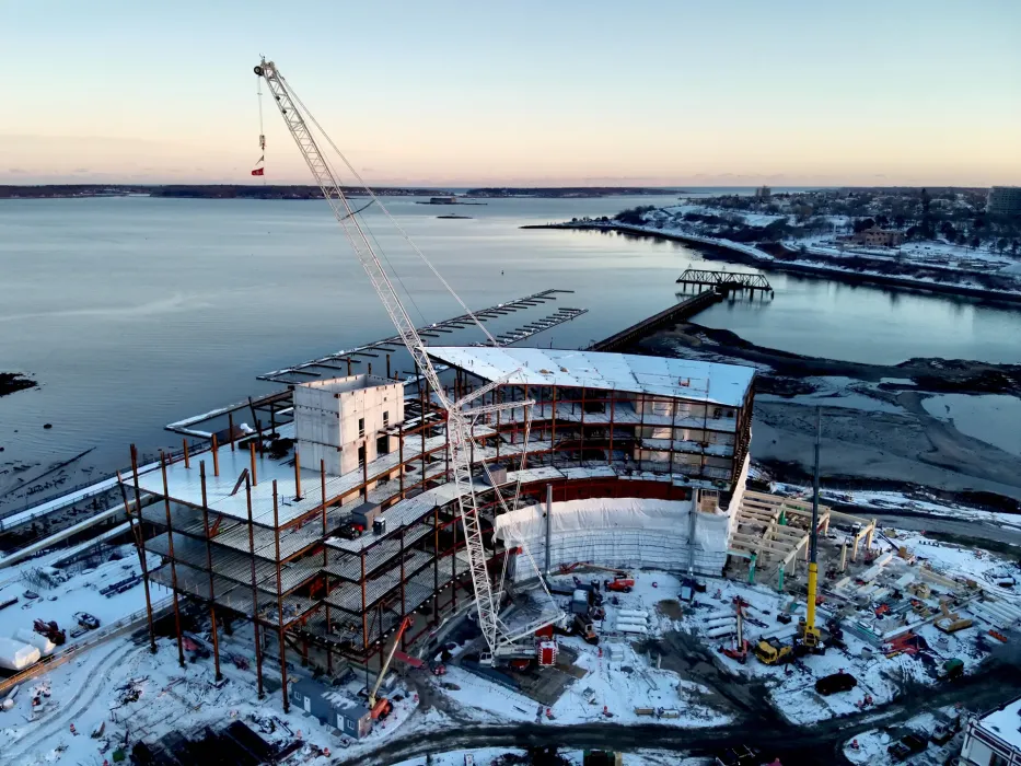 Northeastern University’s Roux Institute marked a major construction milestone on its Portland, Maine, campus with the topping off of the Alfond Center.