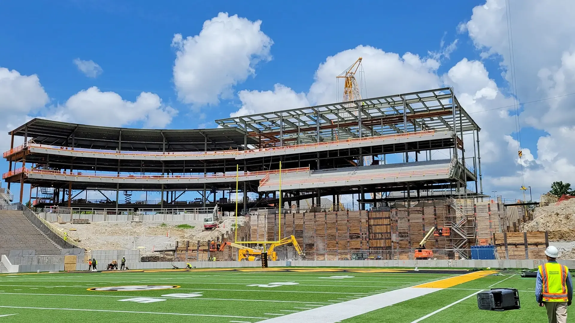 The North End Zone expansion added two levels of elevated club suites and seating directly behind the end zone, completing the enclosure of the stadium bowl. 