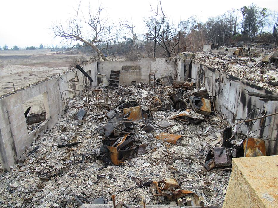 Approximately half of the homes had slabs-on-grade with no basement. The other half of the homes had walkout basements with CMU retaining walls and elevated decks supported on concrete deck piers.
