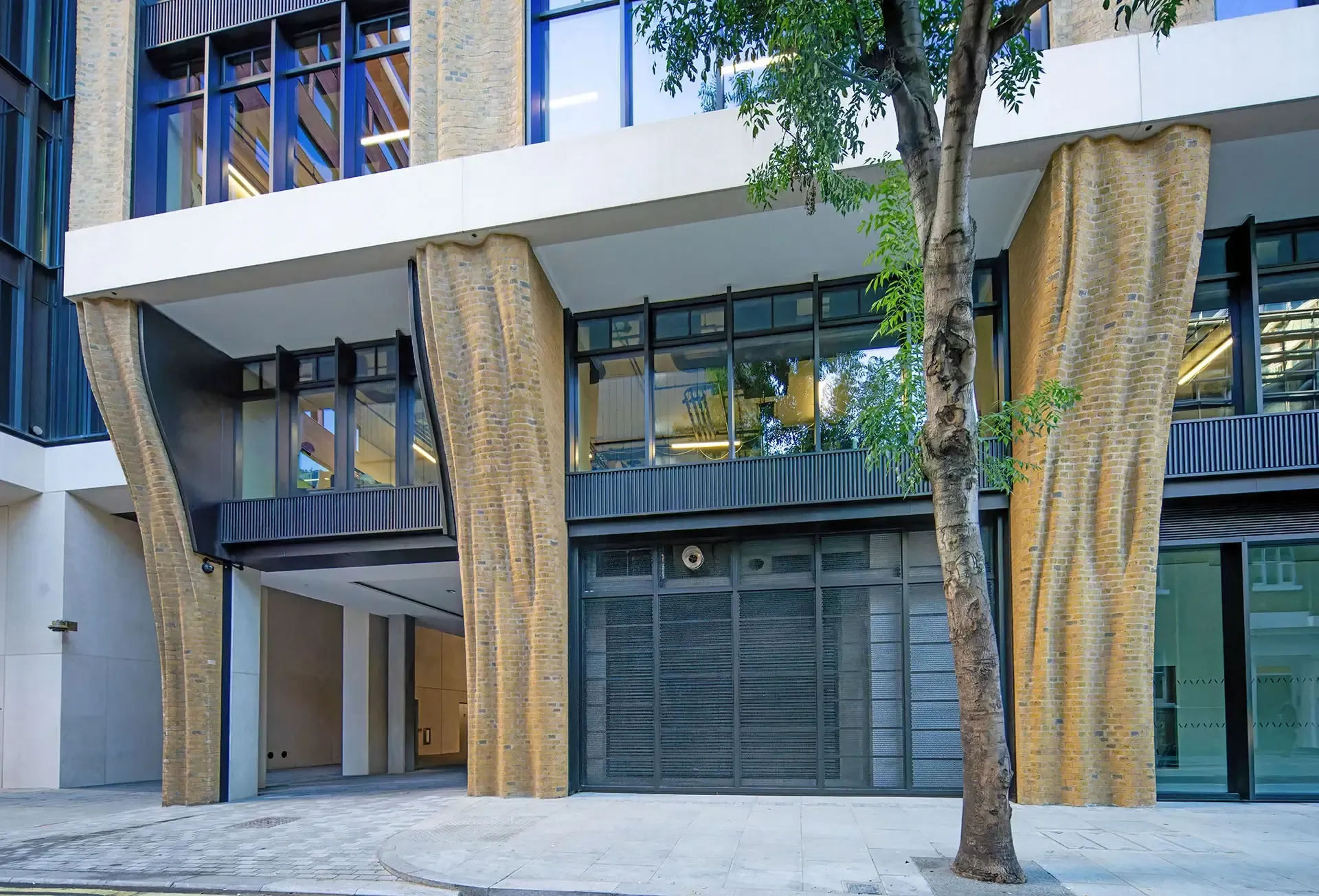 Using brick-faced precast in place of fully hand-laid brickwork made it possible to achieve the sculpted geometry with tighter quality control, reduced site labor, and a more efficient installation process.