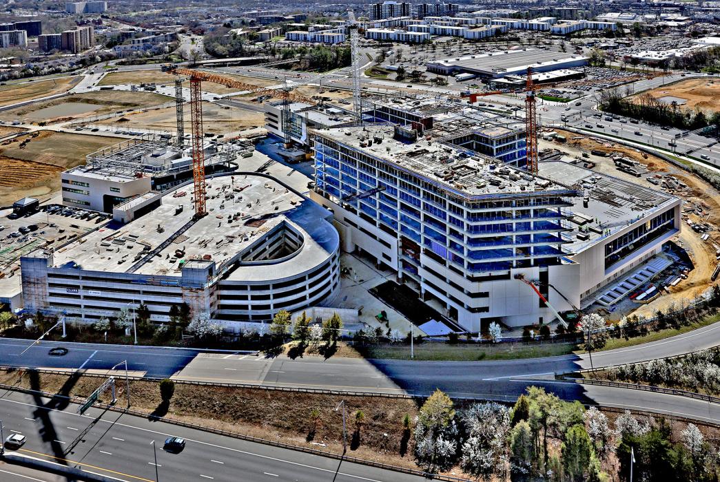 The design allows for future vertical expansion of the inpatient bed tower without modifications to the base structure, anticipating long-term growth and avoiding costly disruptions down the line. 