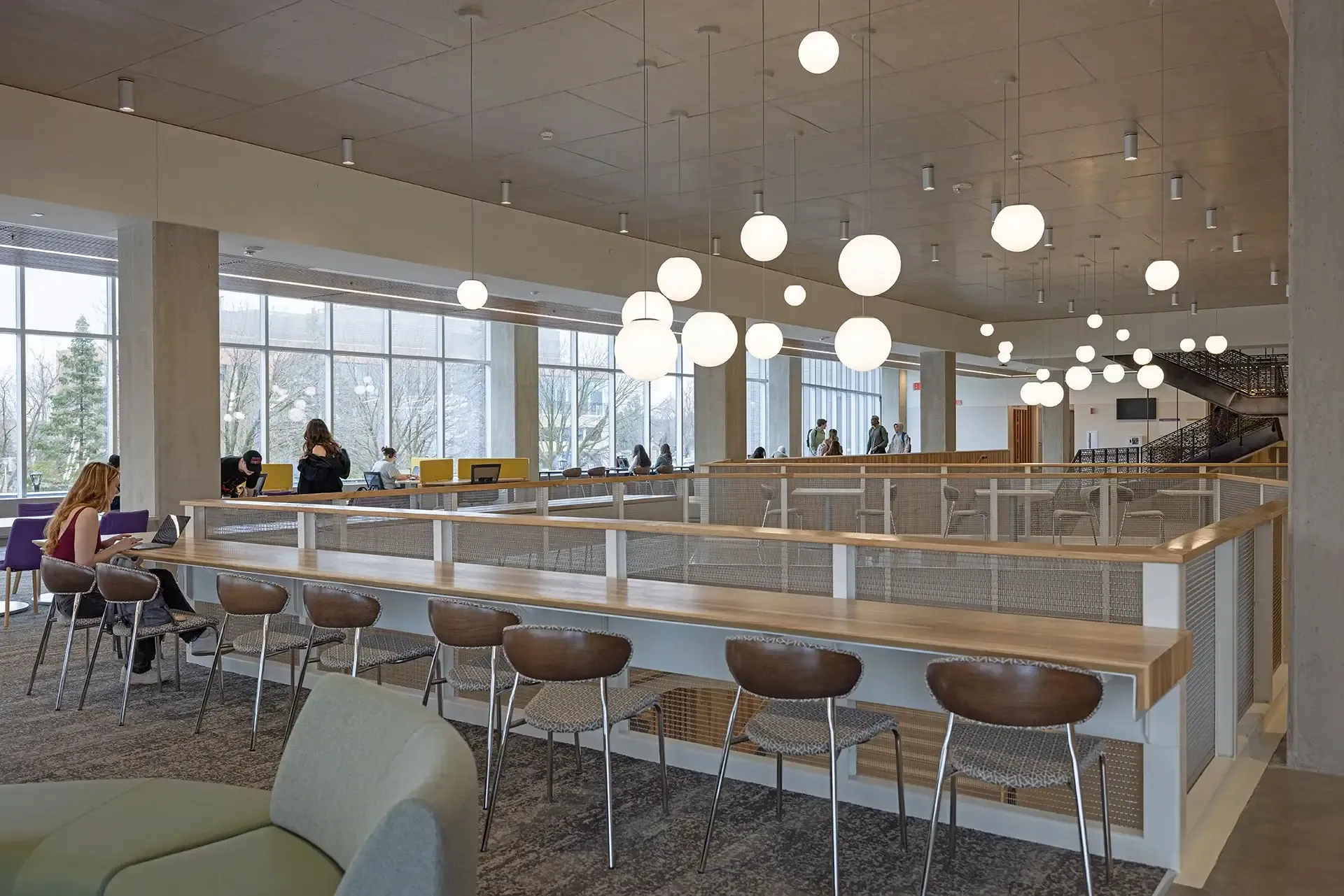 The building’s interior also features architecturally exposed concrete columns and ceilings, requiring careful detailing of these elements.