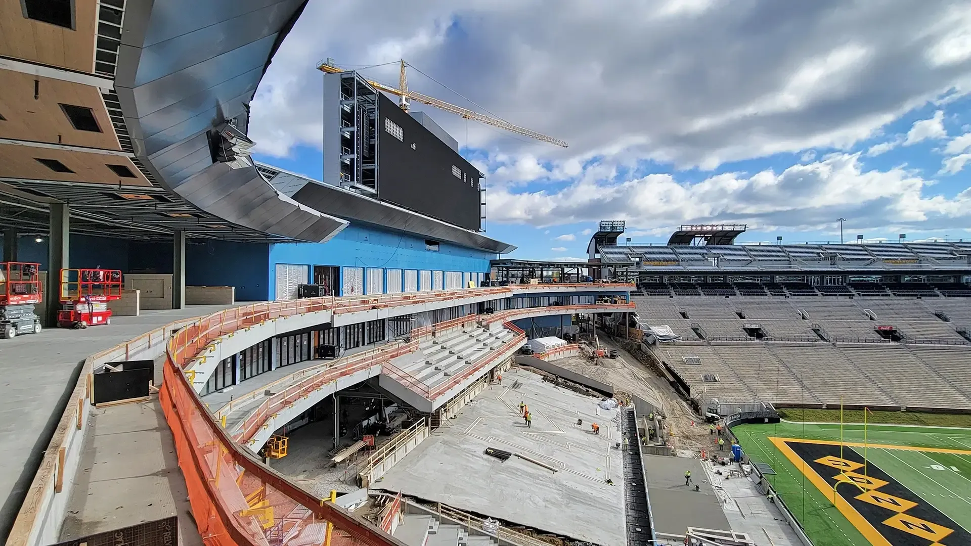 The North End Zone uses circumferential steel moment frames and radial steel bracing supported on drilled piers. 