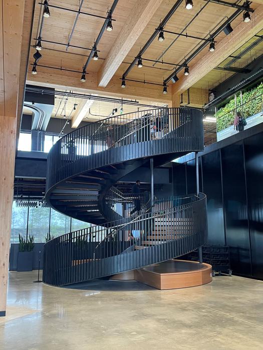 A 30-foot square bay module uses cross-laminated timber decks along with glulam beams and columns.