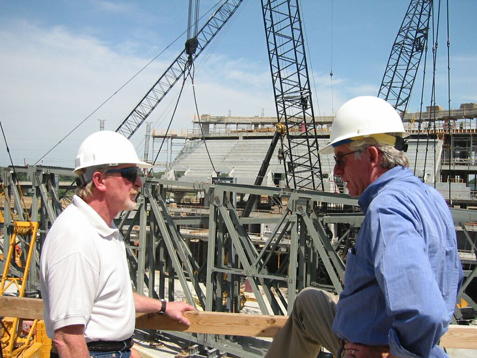 Vice President Mike DeLashmit and Charlie Thornton on site at CenturyLink Center Omaha in the early 2000s.