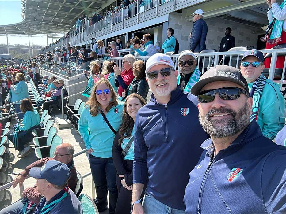 From left, Project Engineer Christine Keith, Administrative Assistant Emily Kepley, Kansas City Office Director Matthew Farber and Principal Kevin Legenza at the opening for CPKC Stadium in Kansas City.