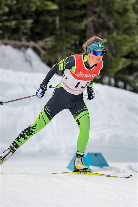 Caitlin racing in her club suit of the Craftsbury Green Racing Project of Vermont, while at a competition in Western Canada in winter 2022.