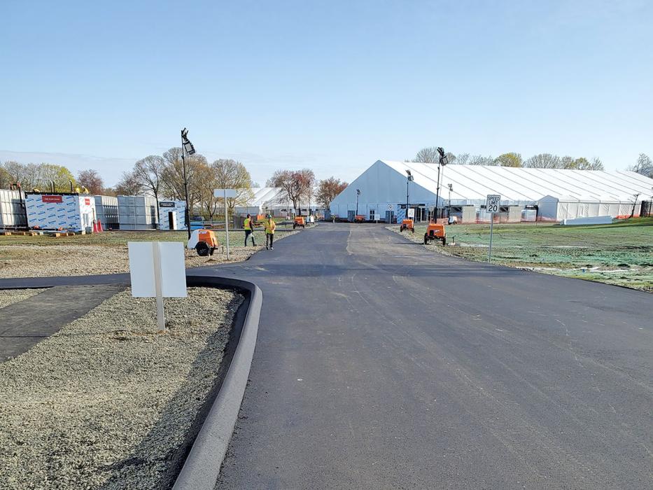 SUNY Stony Brook Alternate Care Facility. A temporary road connected the tents, four of which were constructed on grass.