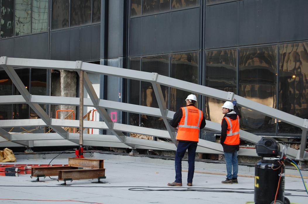 Skylight erection progress under review by Thornton Tomasetti's facade engineers.